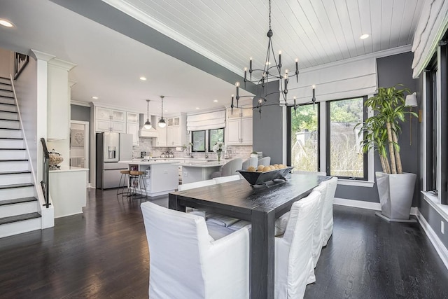 716 Split Rail Dr, Brentwood, TN 37027 - dining space featuring dark wood-type flooring, stairs, a chandelier, ornamental molding, and recessed lighting