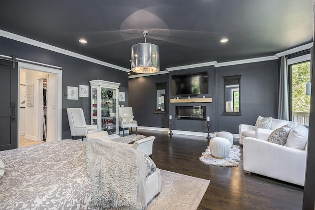 716 Split Rail Dr, Brentwood, TN 37027 - living room with wood finished floors, crown molding, baseboards, recessed lighting, and a barn door