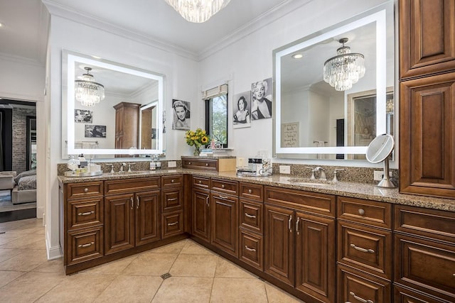 716 Split Rail Dr, Brentwood, TN 37027 - bathroom with a chandelier, tile patterned floors, crown molding, and double vanity