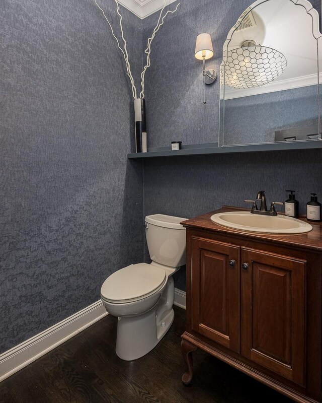 716 Split Rail Dr, Brentwood, TN 37027 - bathroom featuring wood finished floors, toilet, baseboards, and vanity