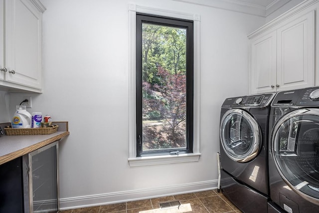 716 Split Rail Dr, Brentwood, TN 37027 - washroom featuring cabinet space, independent washer and dryer, baseboards, ornamental molding, and beverage cooler