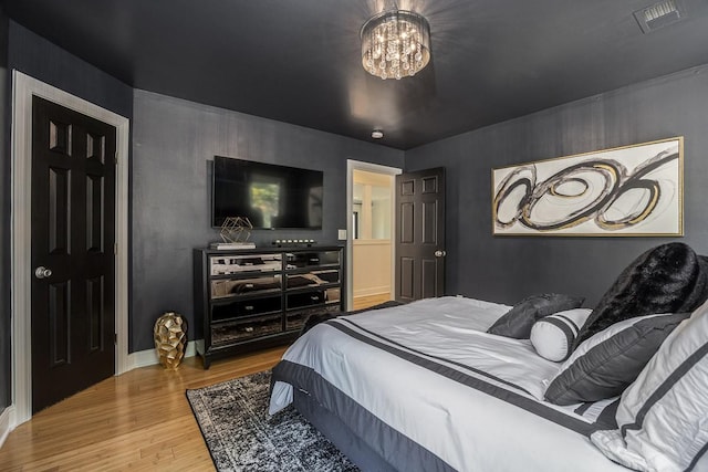 716 Split Rail Dr, Brentwood, TN 37027 - bedroom featuring wood finished floors, a chandelier, and baseboards