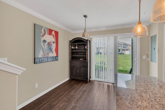 127 Cobblestone Place Dr, Goodlettsville, TN 37072 - unfurnished dining area featuring dark wood-style flooring, electric panel, crown molding, and baseboards