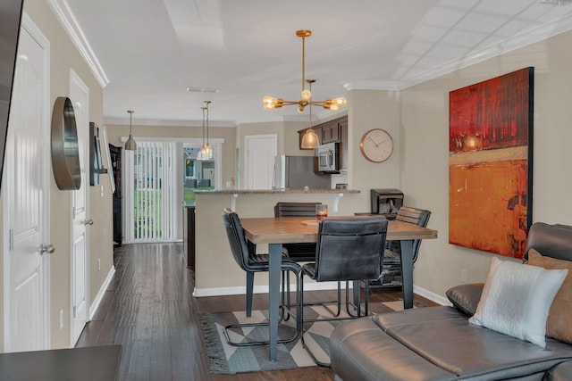 127 Cobblestone Place Dr, Goodlettsville, TN 37072 - dining space with baseboards, a chandelier, dark wood-style floors, and crown molding