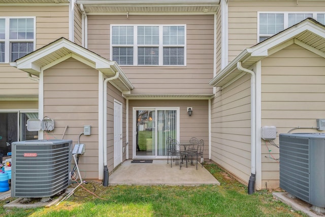 127 Cobblestone Place Dr, Goodlettsville, TN 37072 - rear view of property with central AC and a patio area