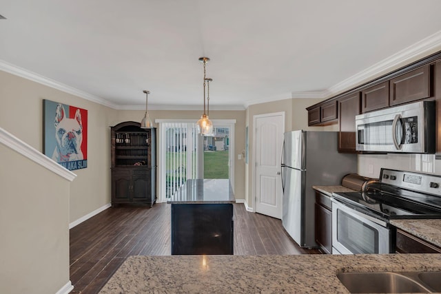 127 Cobblestone Place Dr, Goodlettsville, TN 37072 - kitchen with stainless steel appliances, light stone countertops, baseboards, dark brown cabinetry, and crown molding
