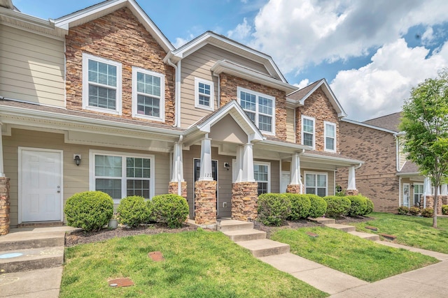 127 Cobblestone Place Dr, Goodlettsville, TN 37072 - view of front of property featuring a front yard, stone siding, and a porch