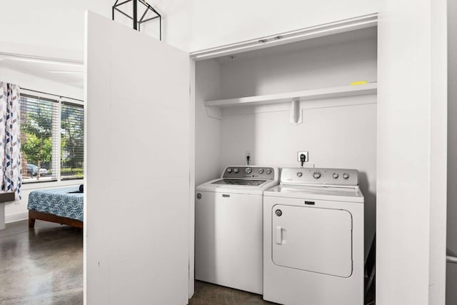 laundry room featuring washing machine and clothes dryer