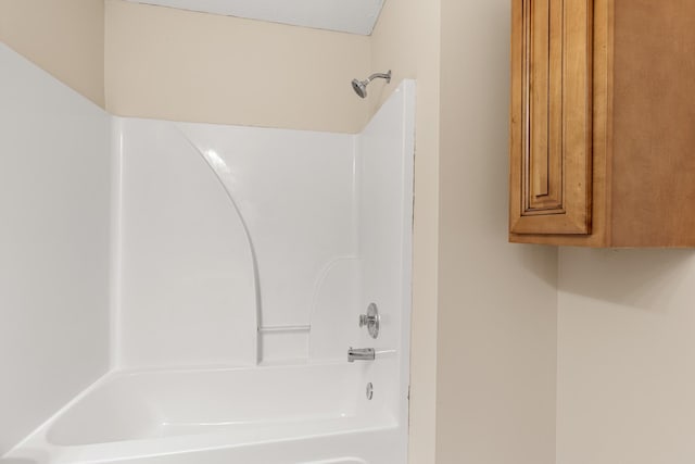 bathroom with shower / bath combination