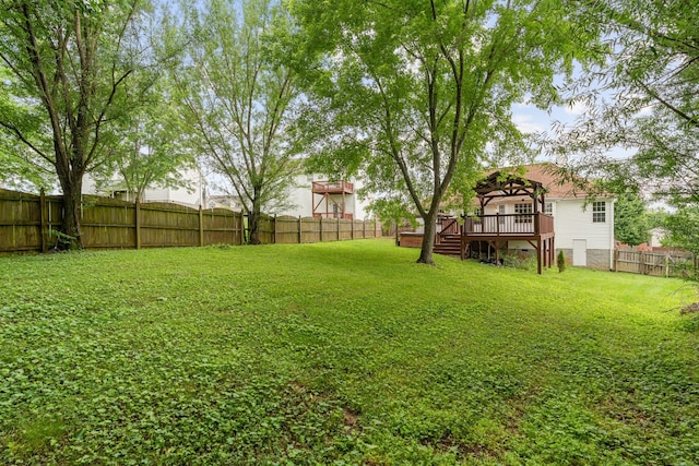 view of yard with a gazebo and a wooden deck