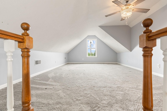 bonus room featuring carpet flooring, ceiling fan, vaulted ceiling, and baseboards