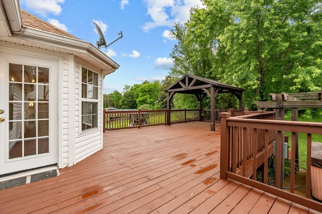 wooden terrace with a gazebo