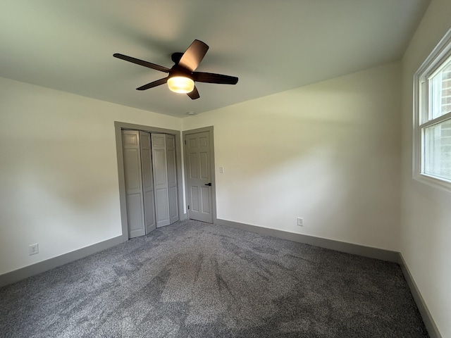 305 Twelve Oaks Rd, Tullahoma, TN 37388 - unfurnished bedroom featuring carpet, baseboards, a closet, and a ceiling fan