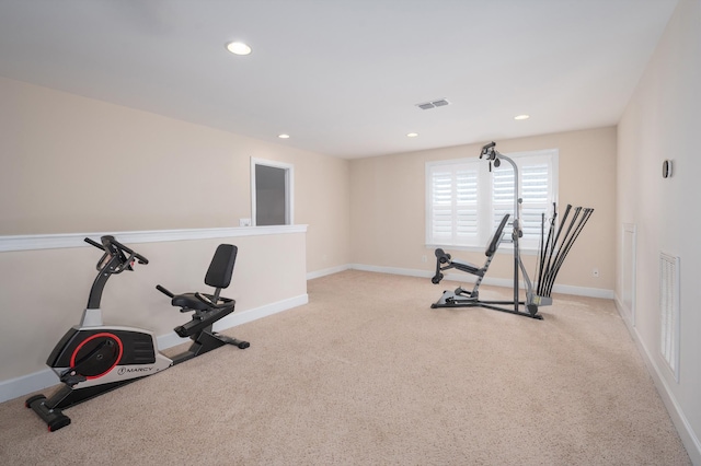 exercise area with carpet floors, recessed lighting, and baseboards