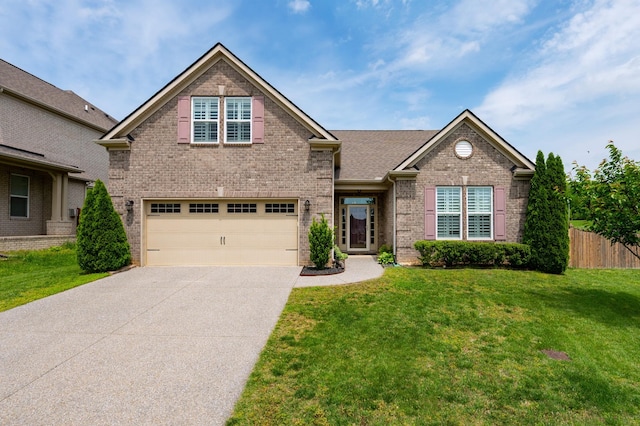 traditional-style house with concrete driveway, a garage, and brick siding