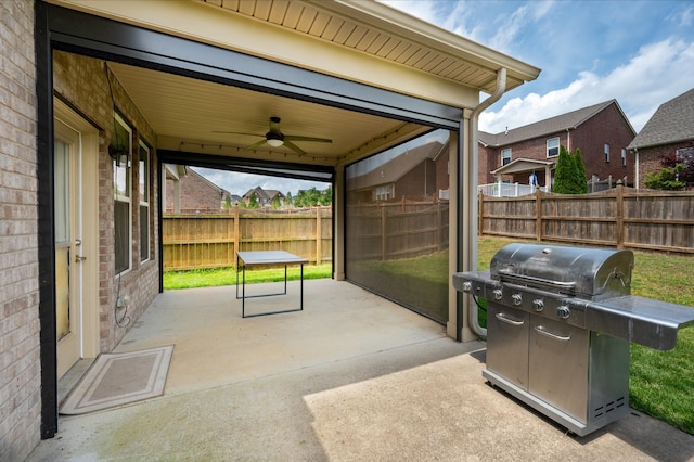 view of patio with a grill, ceiling fan, and a fenced backyard