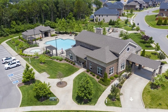 aerial perspective of suburban area with a pool