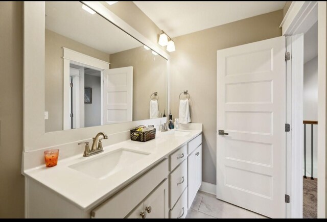 full bath featuring double vanity