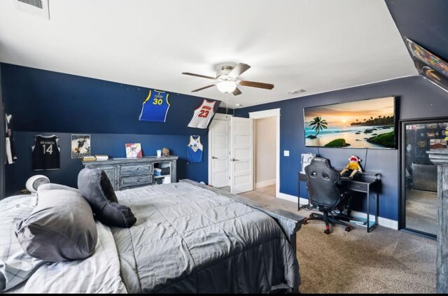 bedroom with carpet, baseboards, and ceiling fan