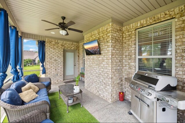 view of patio featuring grilling area, a ceiling fan, and an outdoor hangout area