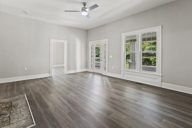 1405 W Lincoln St, Tullahoma, TN 37388 - unfurnished room featuring dark wood-style flooring, ceiling fan, and baseboards