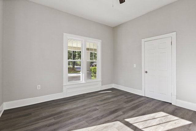 1405 W Lincoln St, Tullahoma, TN 37388 - spare room featuring dark wood finished floors, ceiling fan, and baseboards