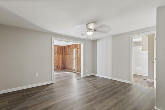 1405 W Lincoln St, Tullahoma, TN 37388 - unfurnished room with a ceiling fan, dark wood finished floors, and baseboards