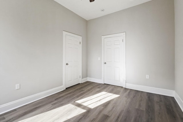 1405 W Lincoln St, Tullahoma, TN 37388 - unfurnished bedroom with wood finished floors, baseboards, and ceiling fan