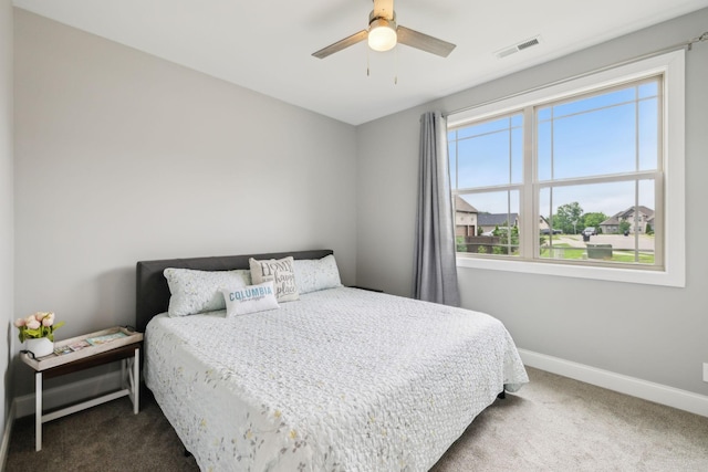 657 Josef Cir, Columbia, TN 38401 - bedroom with dark carpet, baseboards, and ceiling fan