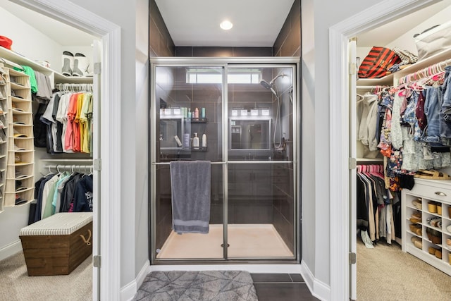 657 Josef Cir, Columbia, TN 38401 - full bathroom featuring a spacious closet, a stall shower, and baseboards