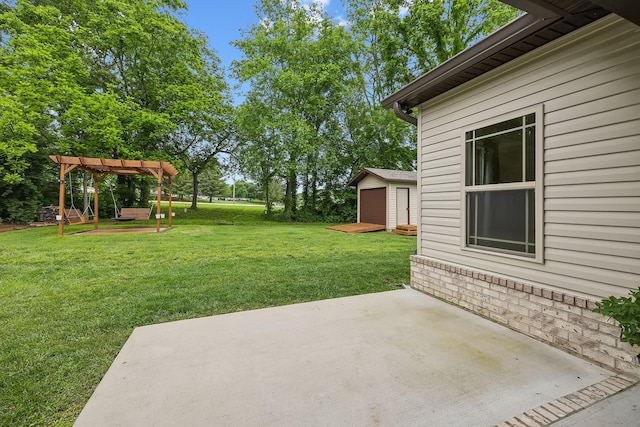 657 Josef Cir, Columbia, TN 38401 - view of grassy yard with a patio, a pergola, and an outdoor structure