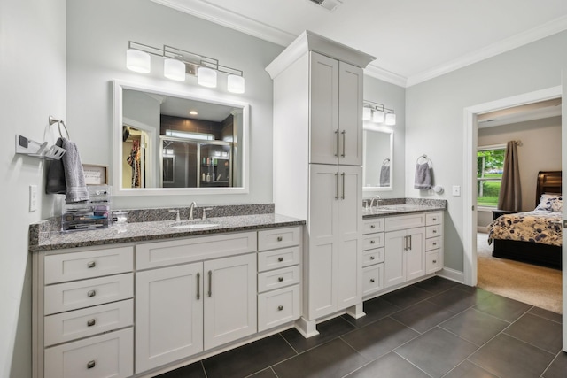 657 Josef Cir, Columbia, TN 38401 - ensuite bathroom with ornamental molding, two vanities, tile patterned floors, and baseboards