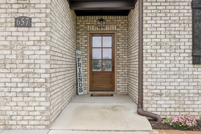 657 Josef Cir, Columbia, TN 38401 - view of exterior entry featuring brick siding