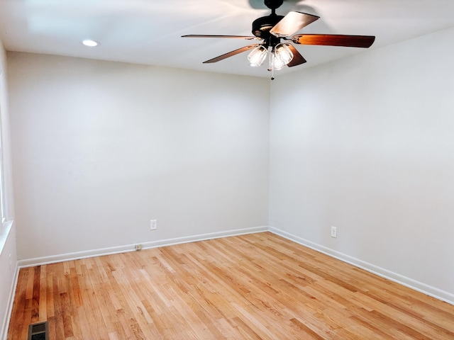 unfurnished room with wood finished floors, baseboards, a ceiling fan, and recessed lighting