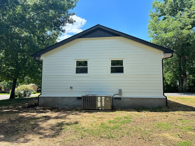 view of property exterior with cooling unit