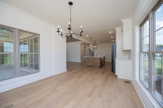 0 Pat Nixon Ct, Murfreesboro, TN 37130 - unfurnished dining area with a chandelier, light wood-style flooring, recessed lighting, baseboards, and ornamental molding