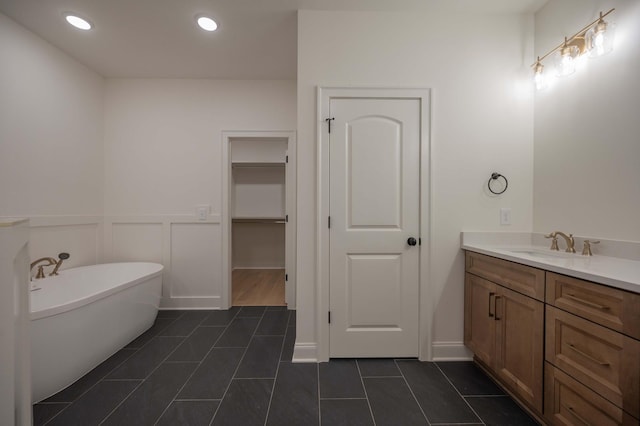 0 Pat Nixon Ct, Murfreesboro, TN 37130 - full bath with vanity, a freestanding tub, tile patterned floors, a wainscoted wall, and recessed lighting