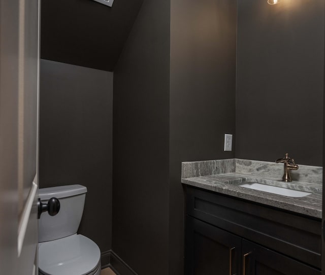 0 Pat Nixon Ct, Murfreesboro, TN 37130 - bathroom featuring toilet, vanity, vaulted ceiling, and baseboards