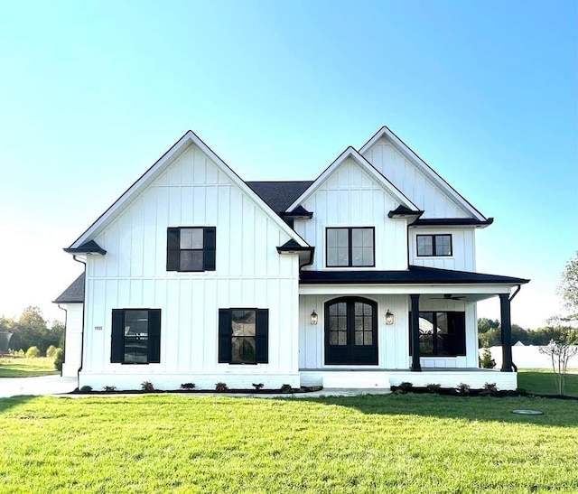 0 Pat Nixon Ct, Murfreesboro, TN 37130 - view of front of house with board and batten siding and a front lawn