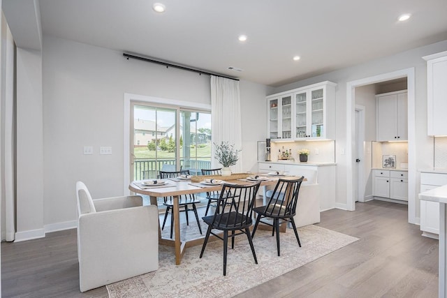 9016 Nestling Ridge Ct, College Grove, TN 37046 - dining room with light wood-style flooring, recessed lighting, and baseboards