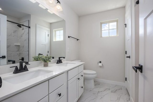 9016 Nestling Ridge Ct, College Grove, TN 37046 - full bathroom featuring marble finish floors, baseboards, toilet, double vanity, and a shower