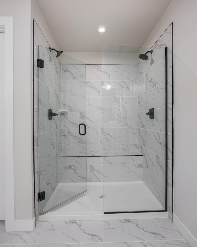 9016 Nestling Ridge Ct, College Grove, TN 37046 - full bath with baseboards, marble finish flooring, a stall shower, and recessed lighting