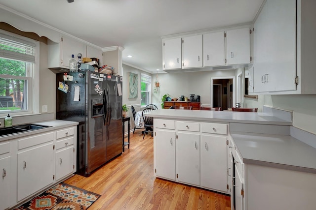 110 Marita Ave, Goodlettsville, TN 37072 - kitchen with black fridge, light wood-style floors, plenty of natural light, a sink, and recessed lighting