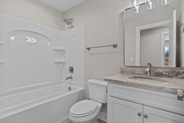 bathroom with toilet, bathtub / shower combination, and vanity