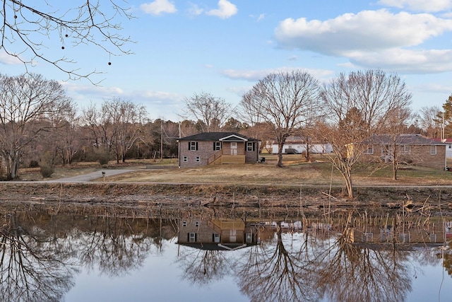 view of yard with a water view
