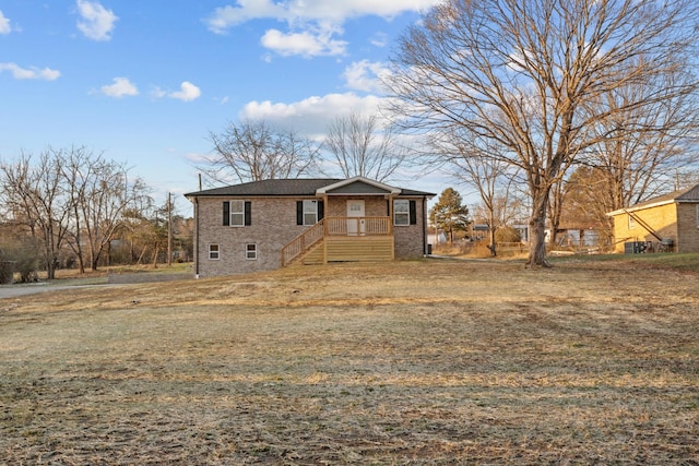 view of front of home featuring brick siding