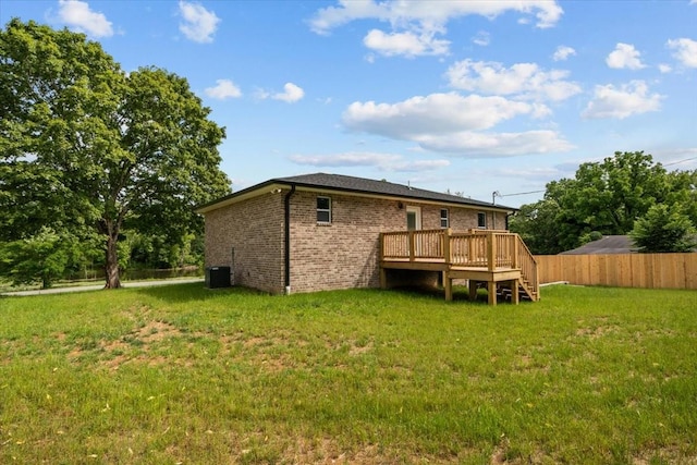 1024 Evans Rd, Burns, TN 37029 - rear view of property with a deck, brick siding, and stairs