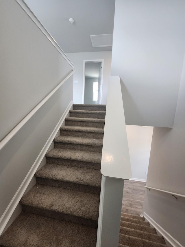 staircase with baseboards