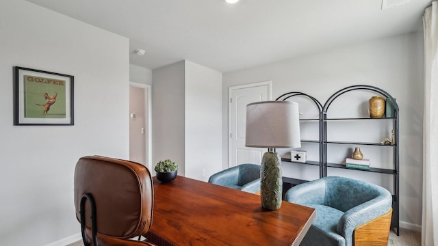 office space featuring baseboards
