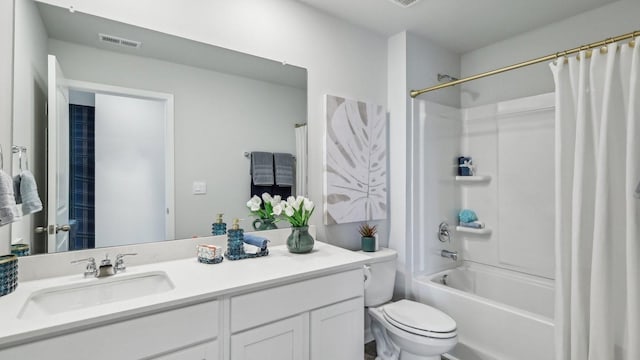 full bathroom with toilet, vanity, and shower / bath combination with curtain